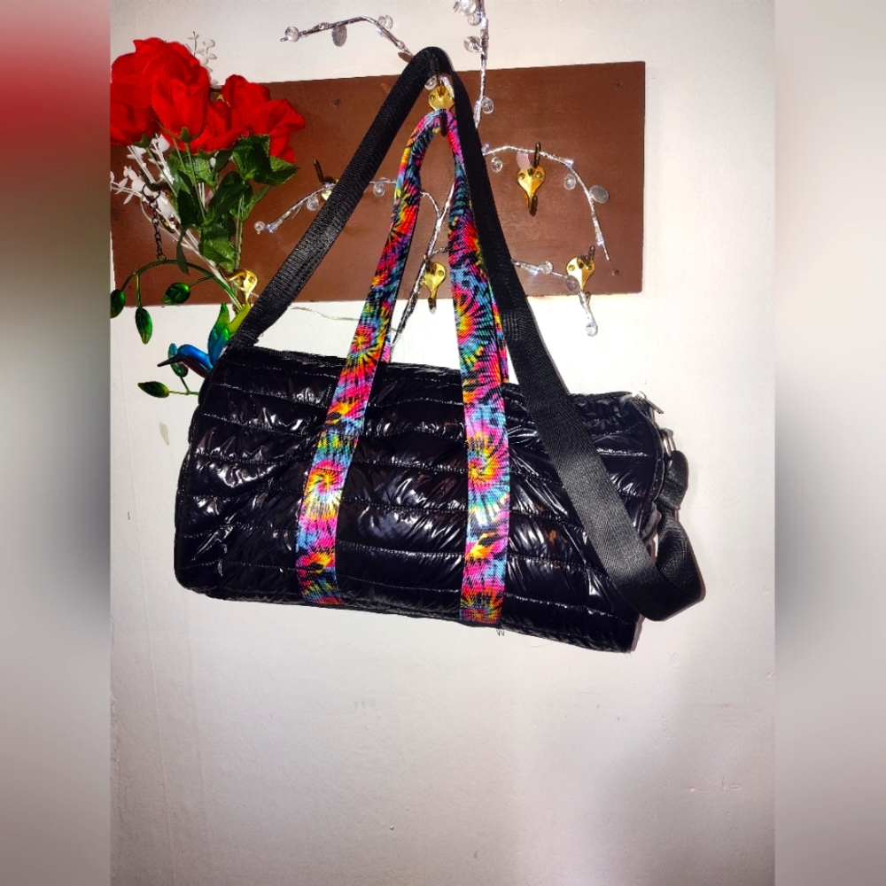 Chic Black Quilted Travel Bag with Colorful Straps